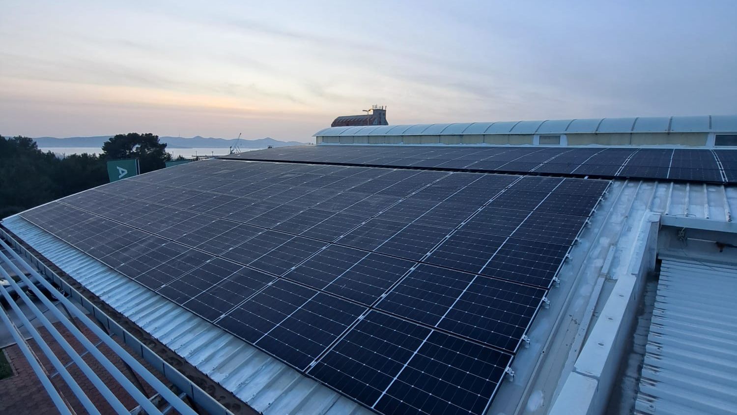 PV system on a roof at sunset