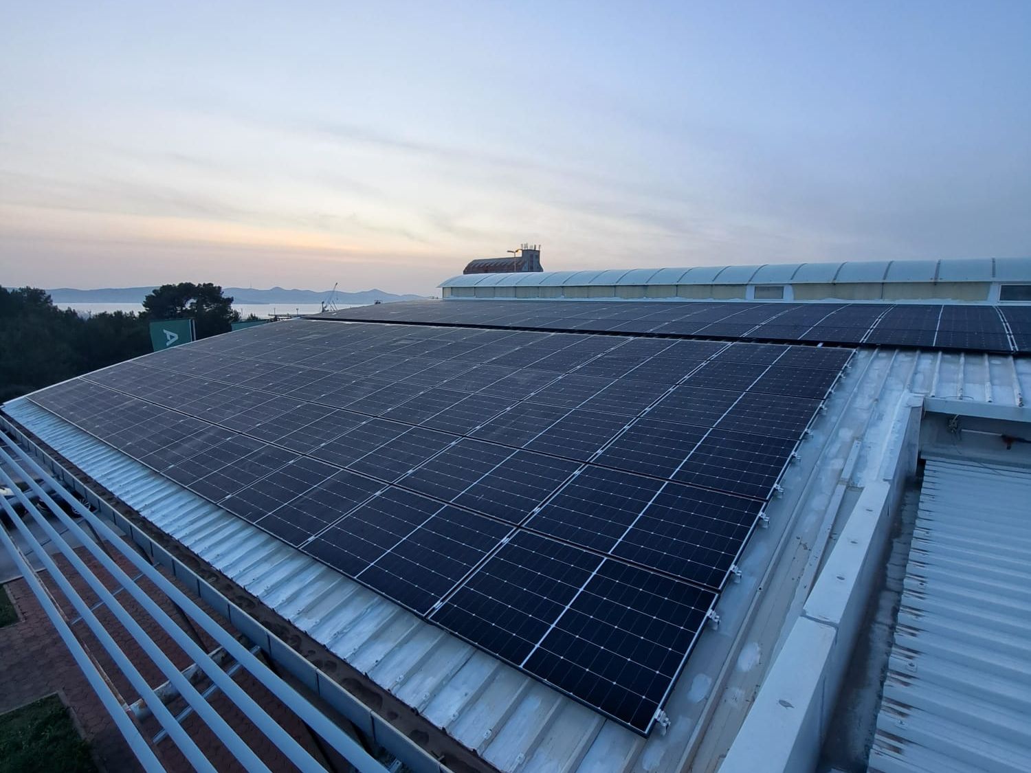 PV system on a roof at sunset