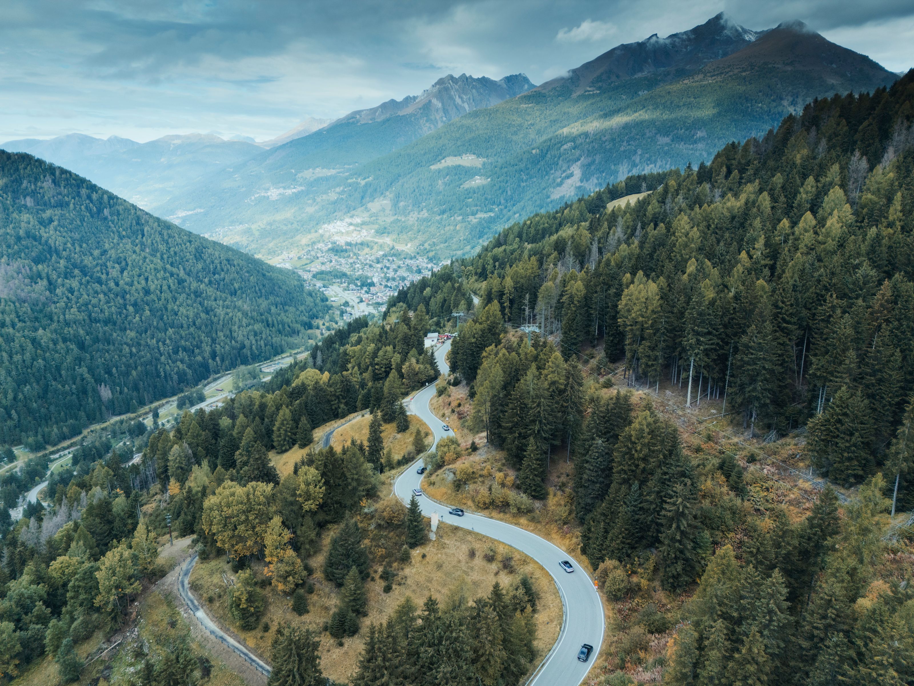 winding road with cars on a mountain