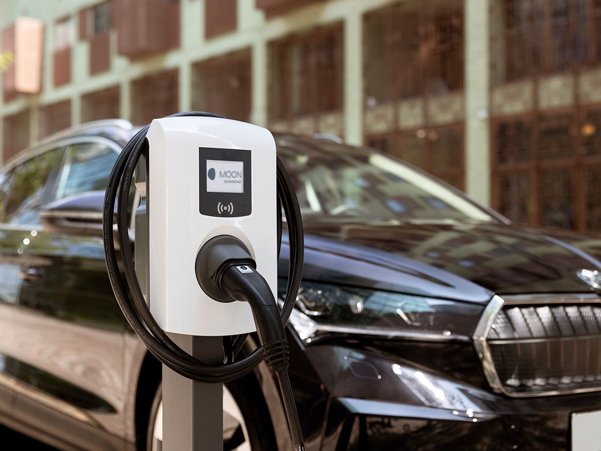 Charging station in front of a car 