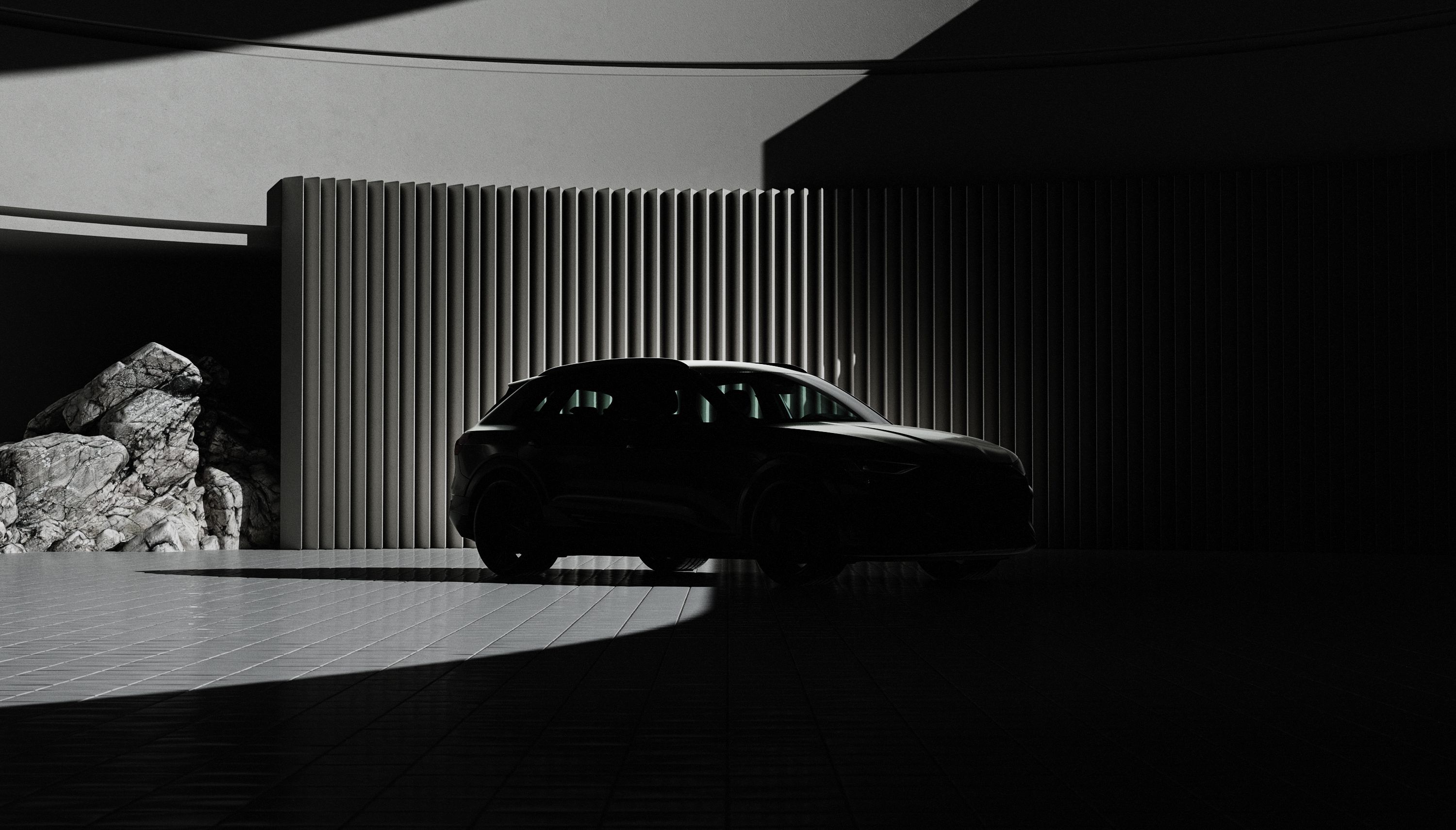 Car in front of a wall