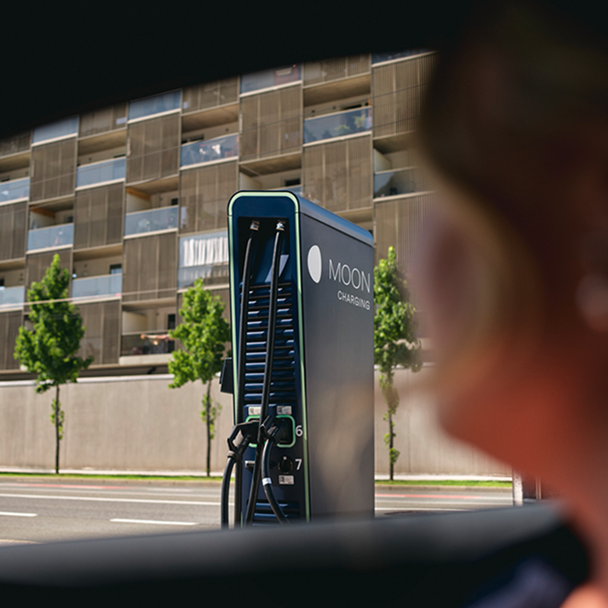 Charging station in front of a street