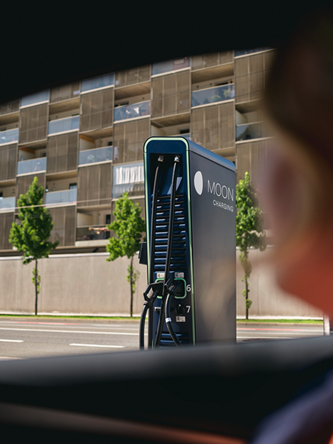 Charging station in front of a street