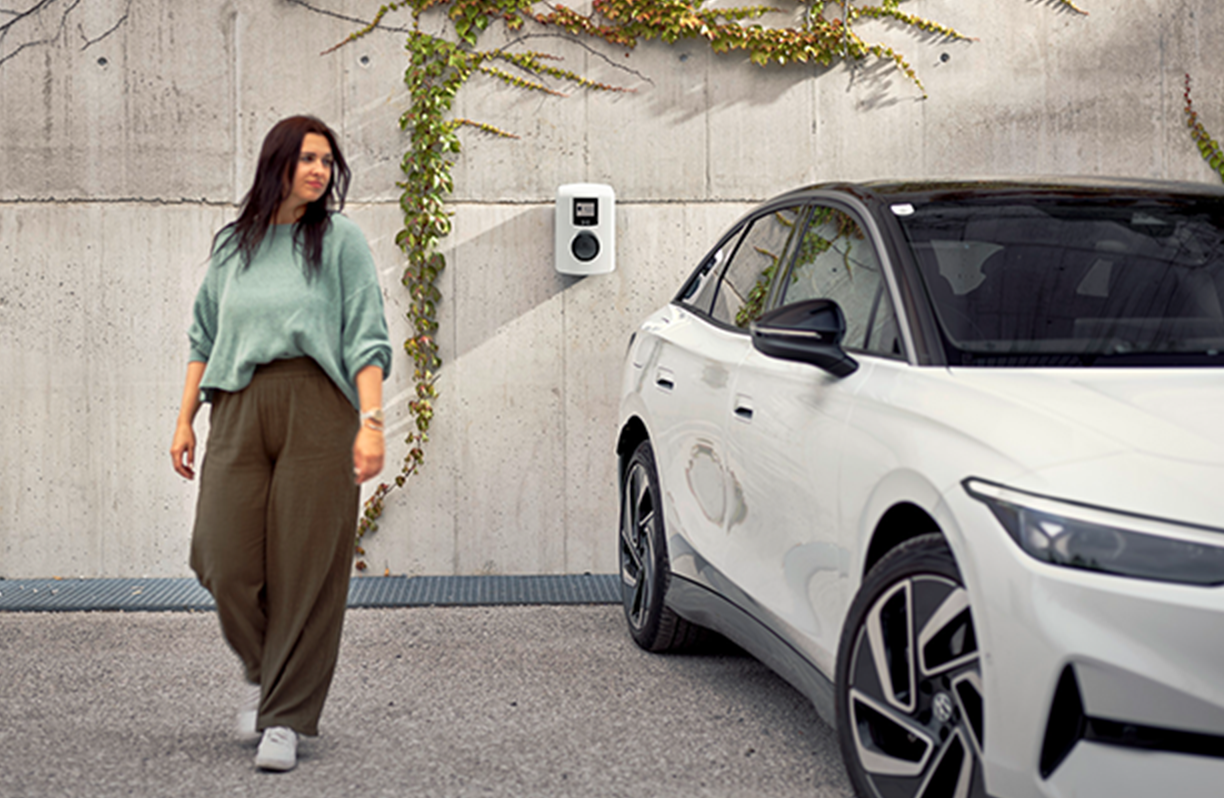 Woman next to a car
