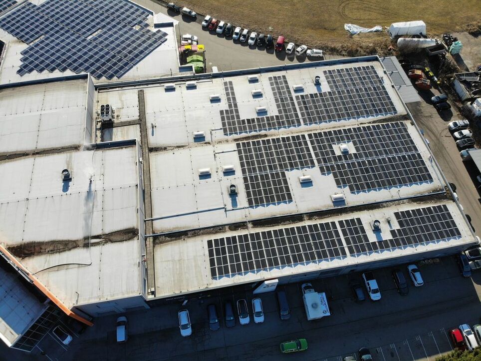 PV system on the roof of Wiegele car dealership, flight view