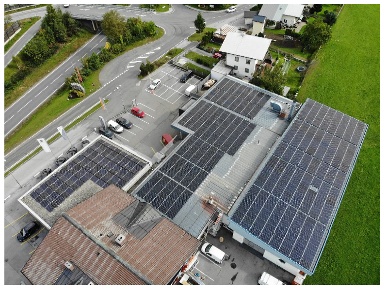 PV system on the roof of Radstad car dealership, flight view
