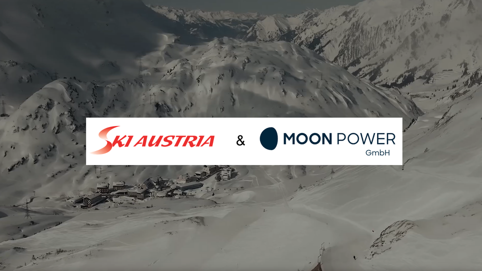 Ski Austria and MOON POWER logos in the from, on the background: moutains